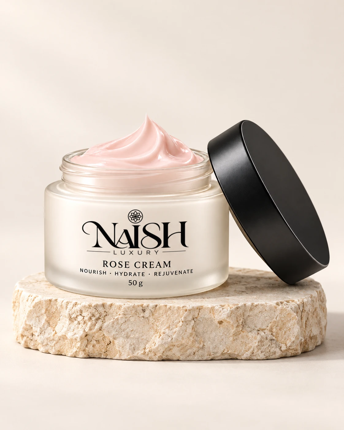 Naish Luxury Rose Cream on a stone pedestal